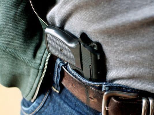 how to conceal a gun without a holster